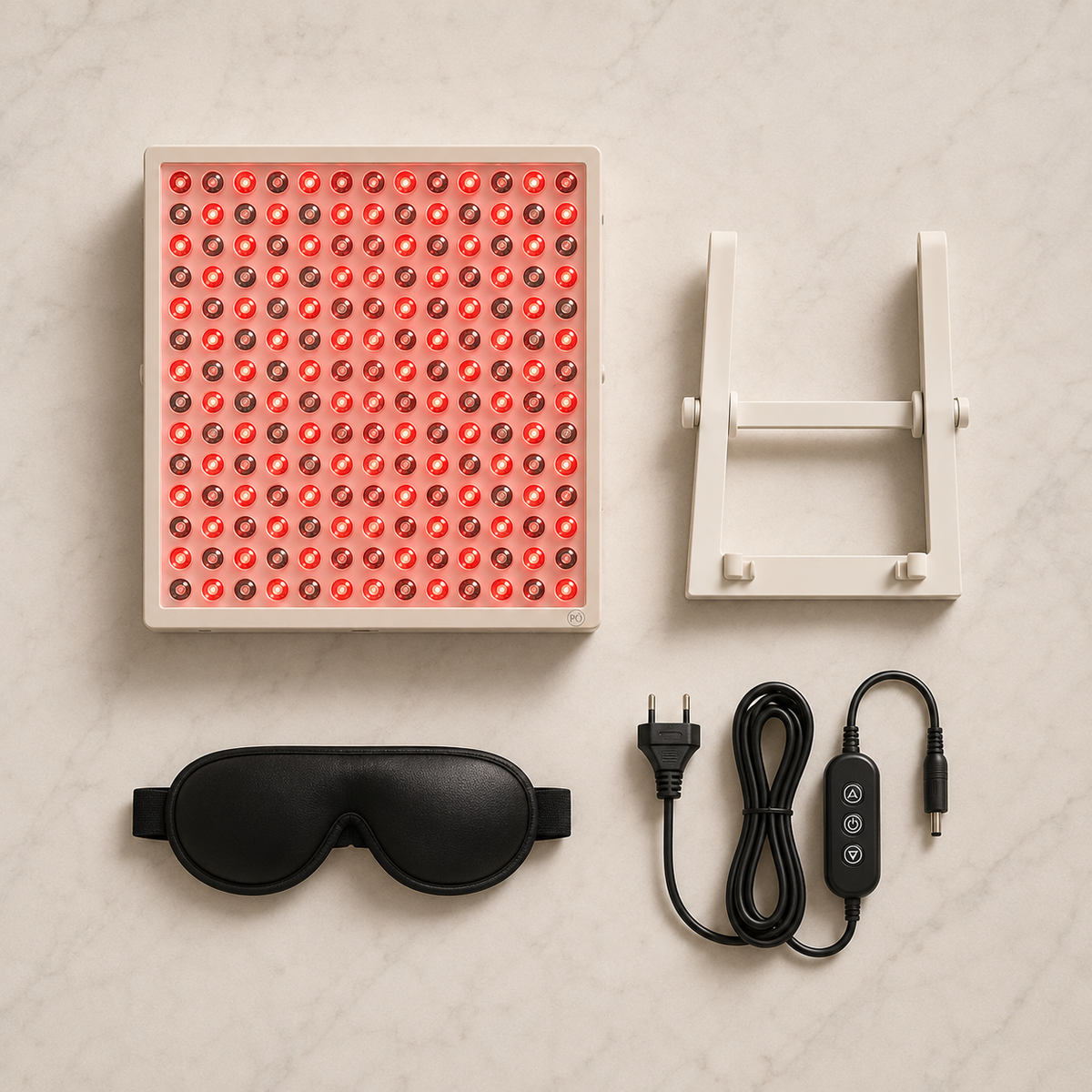 PHŌRMA Panel 45 box contents: LED panel, power switch cable, protective eye mask and desktop stand